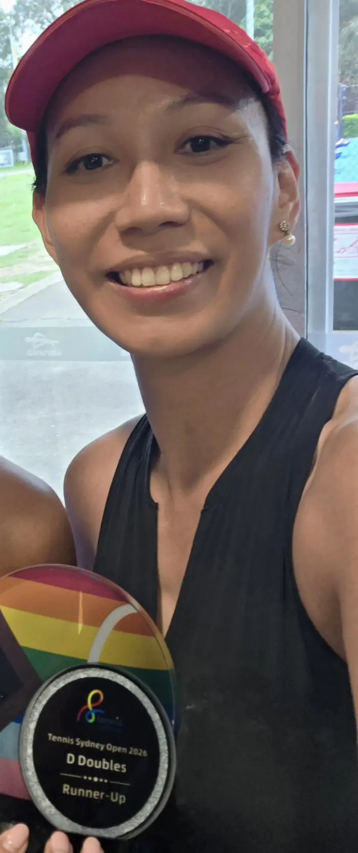 Ana holding the Tennis Sydney Open 2026 D Doubles runner-up trophy